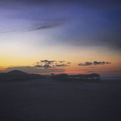 Scenic view of sea against sky at sunset