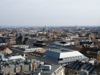 Aerial view of cityscape against clear sky