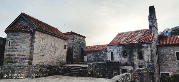 Buildings against sky