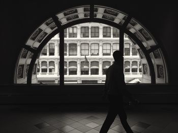 Low angle view of woman in darkroom