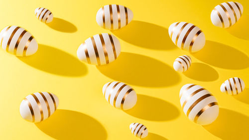 Directly above shot of yellow decorations on table