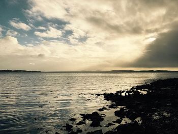 View of sea against cloudy sky