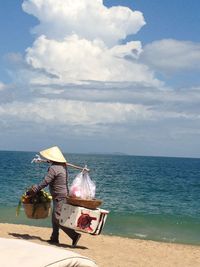 Scenic view of sea against cloudy sky