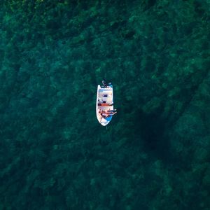 High angle view of ship sailing in sea