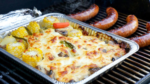 High angle view of food on barbecue grill