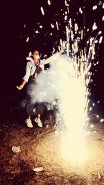 Boy enjoying in park at night