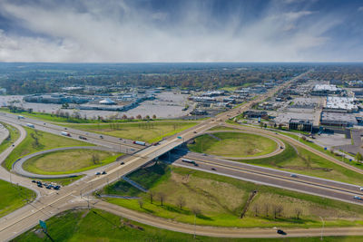 High angle view of highway in city against sky