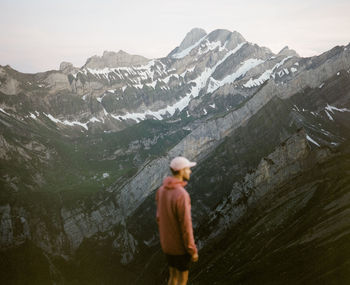 Mountain views while hiking in the swiss alps during blue hour. medium format kodak portra 400 film.