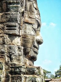 Low angle view of statue against sky