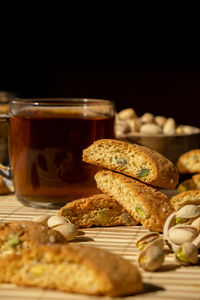 Biscotti cantuccini cookie biscuits with pistachios and lemon peel shortbread. cup of tea. teatime