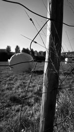 Low angle view of electricity pylon