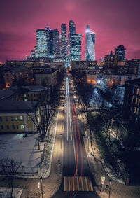 High angle view of illuminated buildings at night