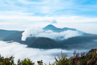 Panoramic view of volcanic mountains against sky