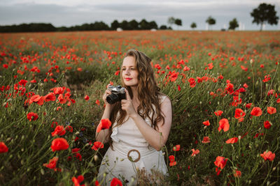 Woman standing on field