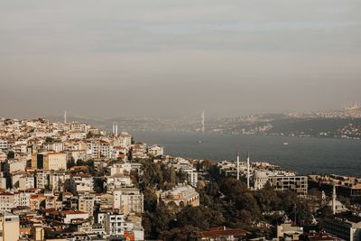 High angle view of cityscape against sky during sunset