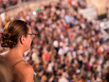 Woman standing at event