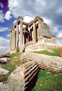 Old ruin building against cloudy sky