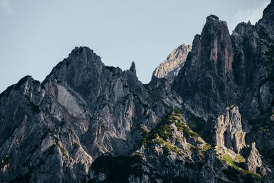 Scenic view of snow covered mountains against sky