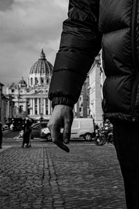Low section of people walking on street