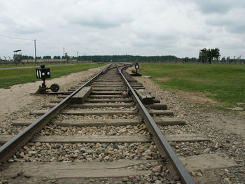 Railroad tracks against sky