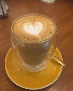 High angle view of cappuccino on table