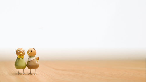 Close-up of figurine on table