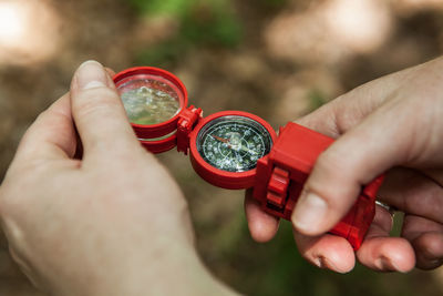 Close-up of hand holding eyeglasses