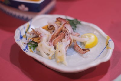 Close-up of octopus in bowl on table