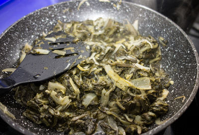 High angle view of cooking vegetables in pan