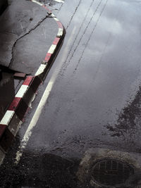 High angle view of puddle on road