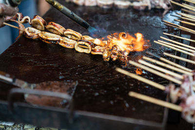 Close-up of meat on barbecue grill