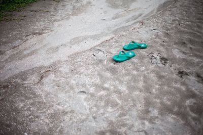 High angle view of toys on the beach