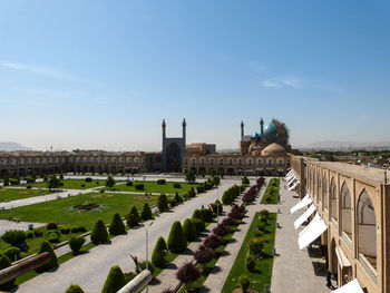 Mid distance view of shah mosque against sky