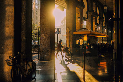 People walking on street at night