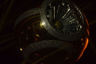 Low angle view of illuminated lamp