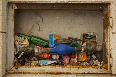 Close-up of garbage in wall