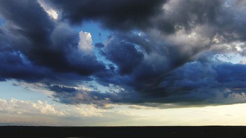 Scenic view of dramatic sky during sunset