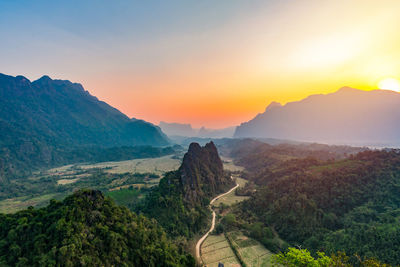 Scenic view of mountains against sky during sunset