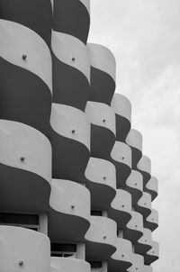 Low angle view of stack against sky