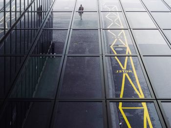 High angle view of text on glass