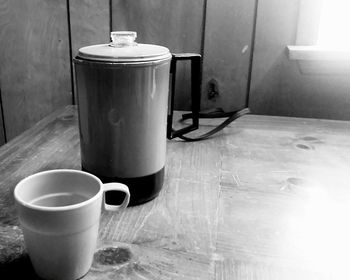 Close-up of coffee cup on table