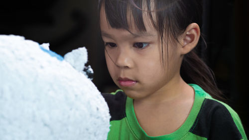 Portrait of cute girl looking away