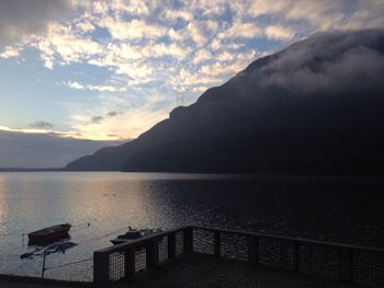 Scenic view of mountains against cloudy sky