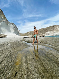 Full length of man walking on beach