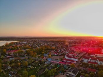 High angle view of townscape against sky during sunset