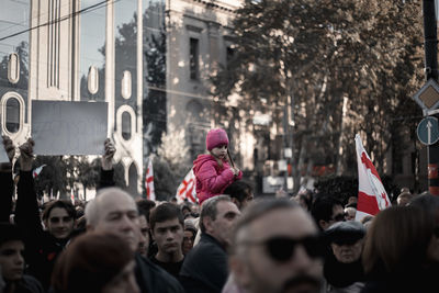 People on street in city