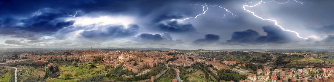 Panoramic view of storm clouds over city