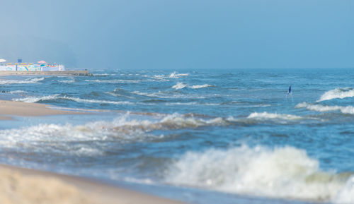 Scenic view of sea against clear sky