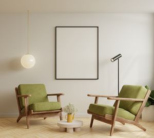 Mock up poster frame in modern interior background with green armchair and accessories in the room