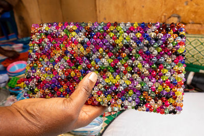 Cropped hand of woman holding a craft bag